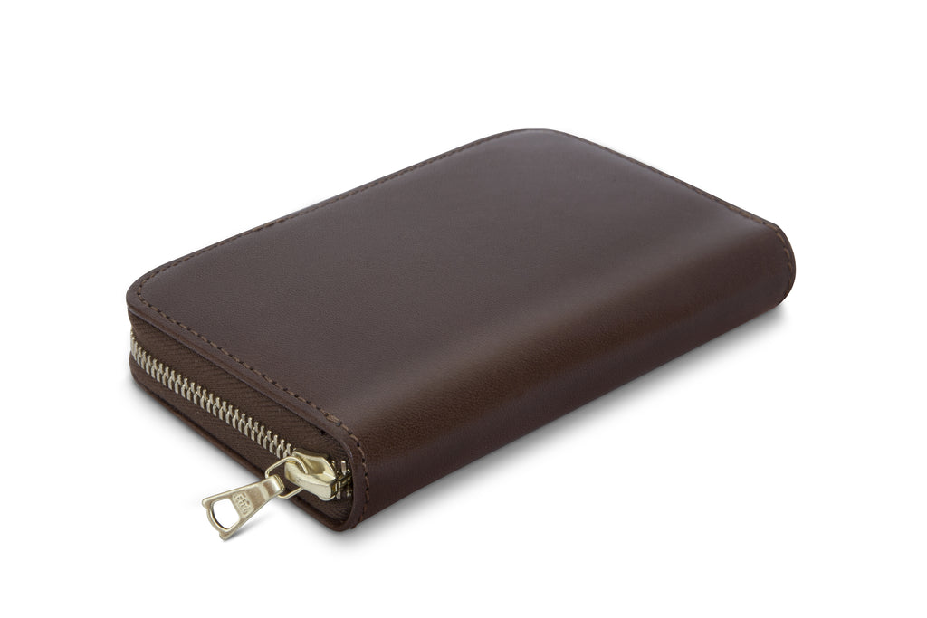 Leather wallet colour brown made from vegetable tanned leather with Riri zipper by LWA Studio. 