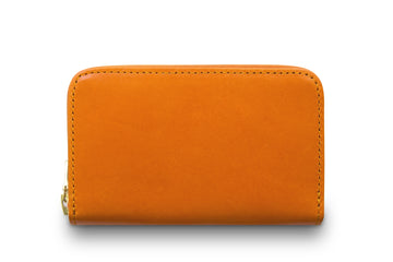 Leather wallet colour orange made from vegetable tanned leather with Riri zipper by LWA Studio. 