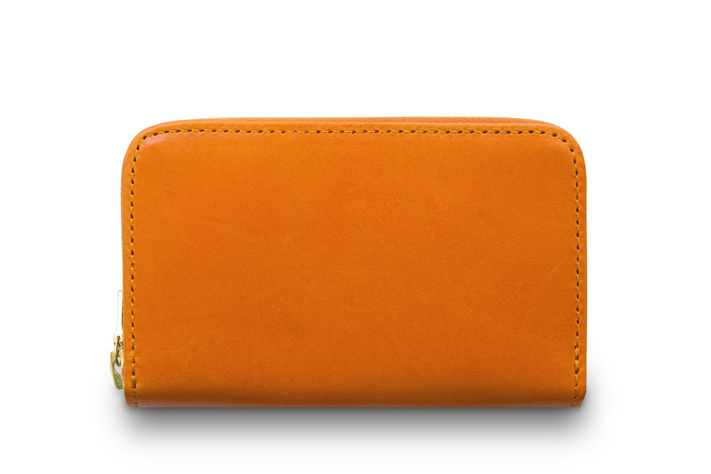 Leather wallet colour orange made from vegetable tanned leather with Riri zipper by LWA Studio. 