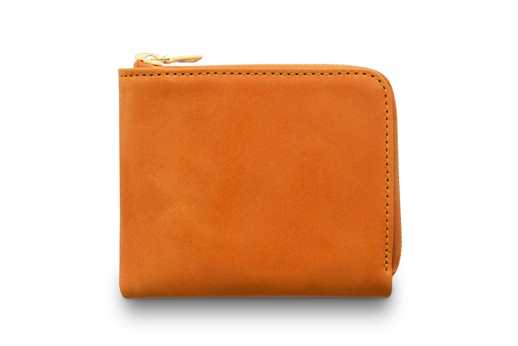 Leather wallet colour orange made from vegetable tanned leather with Riri zipper by LWA Studio.