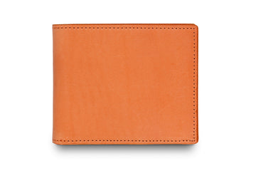 Leather billfold wallet colour orange made from vegetable tanned leather by LWA Studio. 