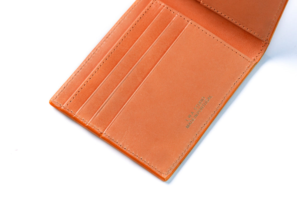 Leather billfold wallet colour orange made from vegetable tanned leather by LWA Studio. 